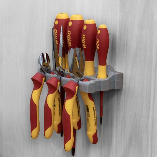 Holder for screwdrivers and pliers